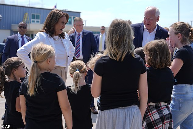 A group of Girl Scouts greeted Kamala Harris and Tim Walz as they landed in Wisconsin.