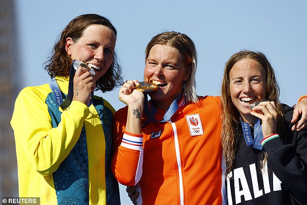 Johnson was eventually edged out in a thrilling three-woman open water race to the finish line by Dutch great Sharon van Rouwendaal, who regained the crown she won in Rio eight years ago.