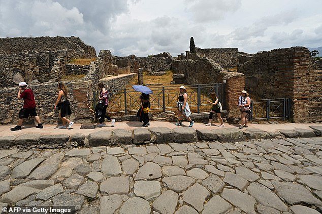 The 37-year-old tourist is likely to be asked to pay for repairs to the ancient site after apologising for carving his initials into the House of the Vestal Virgins.