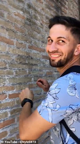 A passerby filmed Mr Dimitrov as he carved the names into the stone walls.