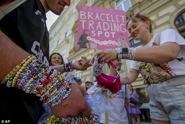 Swifties exchange bracelets in the centre of Vienna