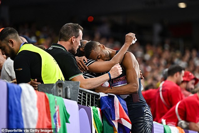 Hudson-Smith was visibly emotional after the race as he hugged his family members.