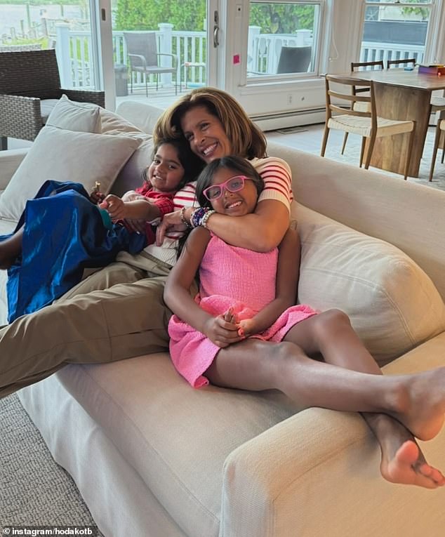 Hoda wasted no time in enjoying a cuddle with her two girls on the couch in her Long Island home.