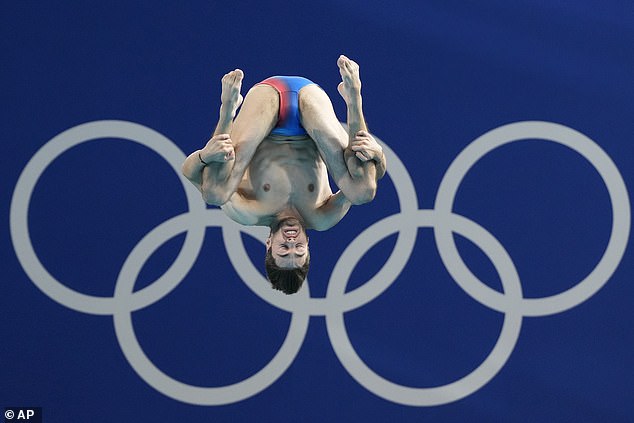 France's Jules Bouyer competes in the men's 3m springboard diving semi-final on August 7