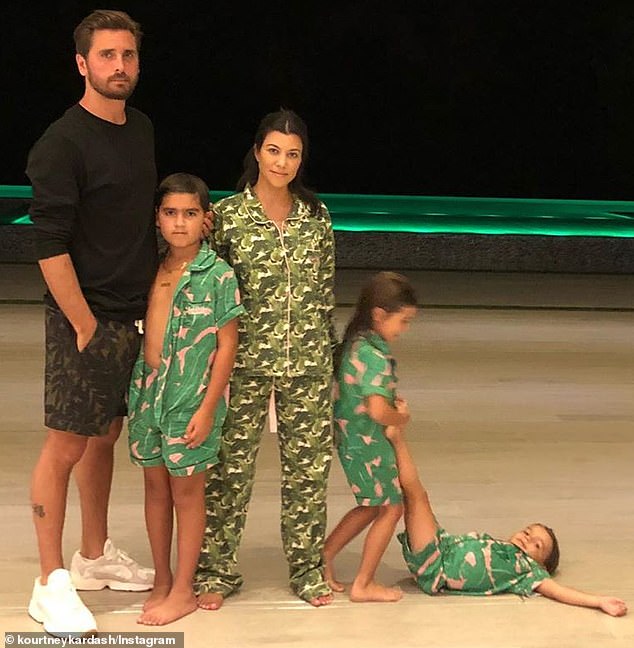 The 41-year-old reality star shares three children with ex-fiancée Kourtney Kardashian: Penelope and sons Mason, 14, and Reign, nine; all photographed in 2018.