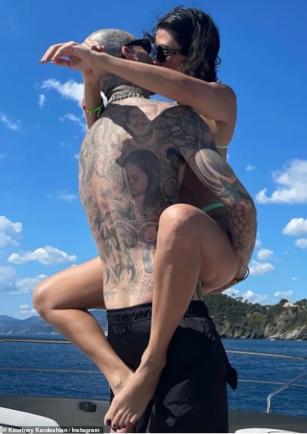 Kourtney and Travis Barker tied the knot at a castle in Portofino in 2022 and have since welcomed a baby boy named Rocky Thirteen; pictured the year of their wedding.