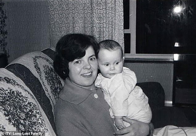 Liz is pictured as a baby in the arms of her adoptive mother, Janice Harrisons, whom Liz praised as a mother 