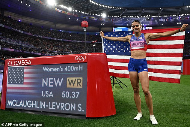 She moved ahead of everyone else in the 400-meter hurdles, beating her old record by three-tenths of a second.