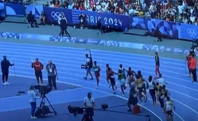 The 5000m heats at the Olympics suffered further disruptions when a cameraman interrupted a race.