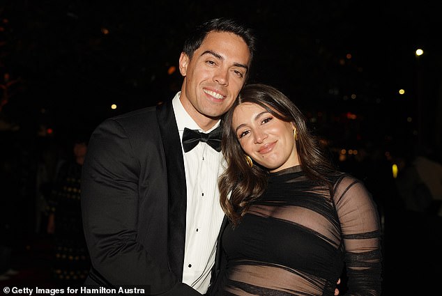 The 'Hot' Purple Wiggle and his bride-to-be opted for classic black tie attire.