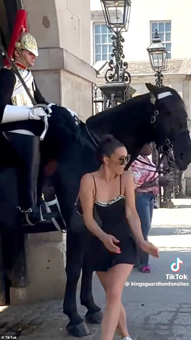 A TikTok video captured her approaching the fountain just as it bared its teeth and took a quick bite on her exposed arm.