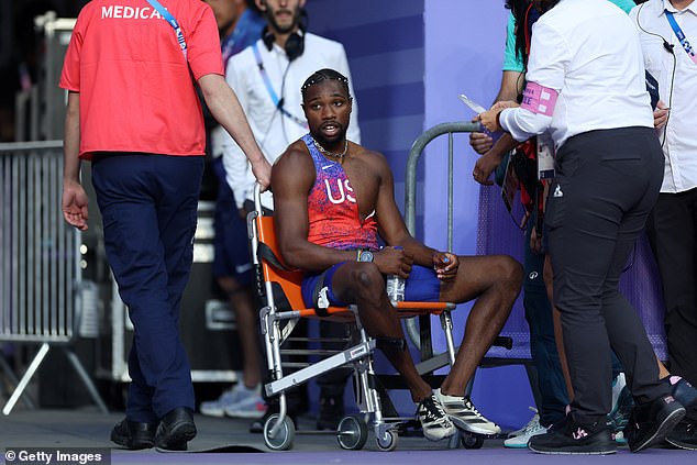 The American had to be taken away in a wheelchair in the moments after the race in shocking scenes.