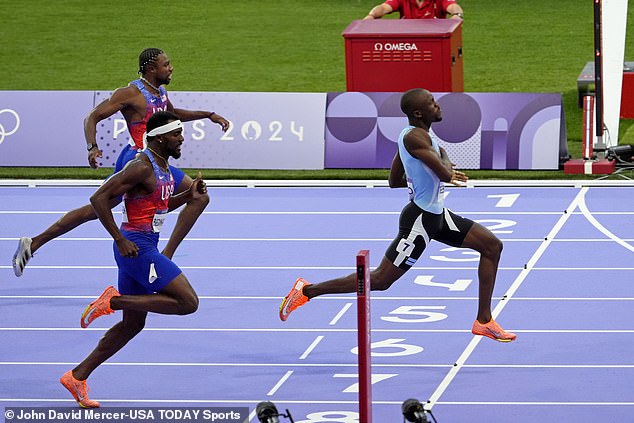 Lyles (back left) crossed the finish line in third place, despite being the heavy favorite.