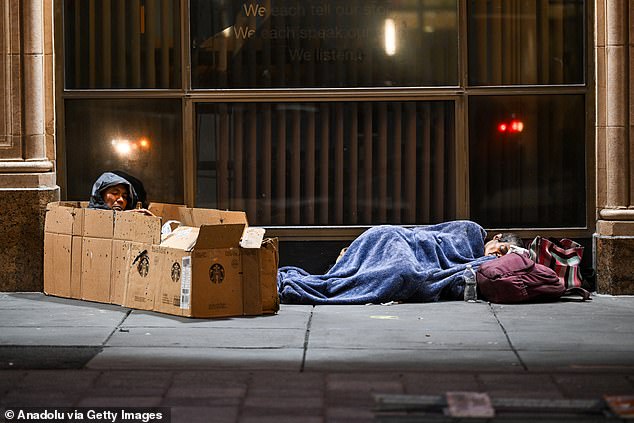 Homeless people are seen on the streets of San Francisco on July 31, 2024, shortly after Newsom issued his executive order to clear out the encampments.