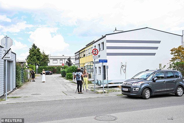 The 19-year-old man, who lived in his parents' home (white house in the photo on the right) together with another man, was arrested on Wednesday after police raided the house, according to Kronen Zeitung.