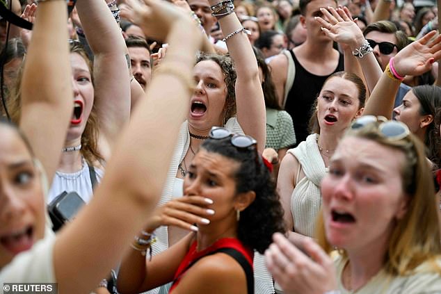 Fans of singer Taylor Swift gather after the cancellation of three Taylor Swift concerts at the Happel Stadium after the government confirmed a planned attack at the venue, in Vienna, Austria, August 8, 2024