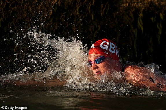 PARIS, FRANCE - AUGUST 09: Hector Pardoe of Team Great Britain competes in the Men's 10km Swimming Race on day fourteen of the Paris 2024 Olympic Games at Pont Alexandre III on August 9, 2024 in Paris, France. (Photo by Adam Pretty/Getty Images)