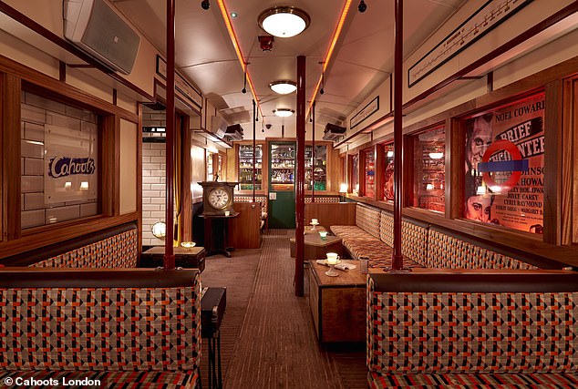 In Cahoots' underground seating area (above), guests can relax in a vintage train car with seating and booths.