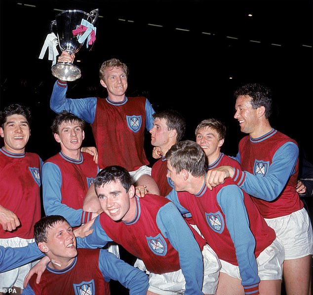 Moore (lifting cup) captained the Hammers to the 1965 European Cup Winners' Cup.