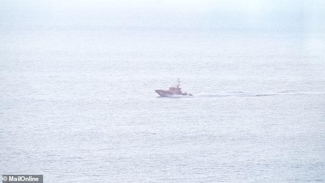 Pictured: The Spanish Coast Guard heads to rescue the small boat.