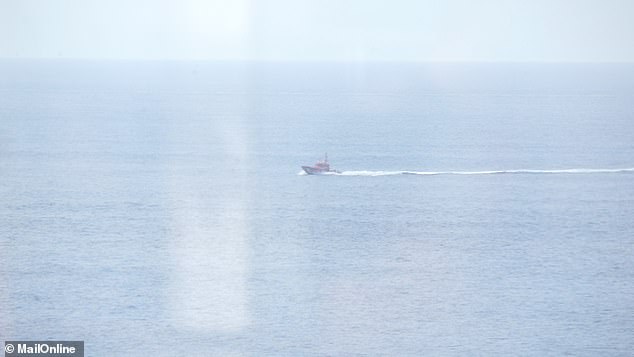 Pictured: The Spanish Coast Guard heads to rescue the small boat.