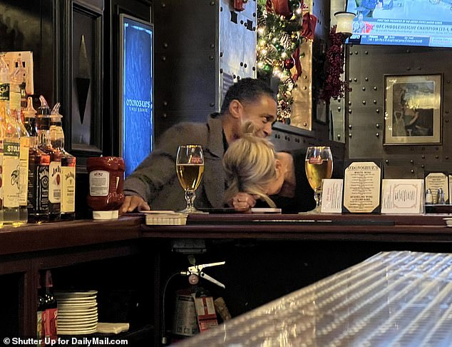 The co-hosts, whose on-screen chemistry had captivated audiences since they joined GMA's third hour, were seen laughing and cuddling with each other at the pub after a morning of filming.