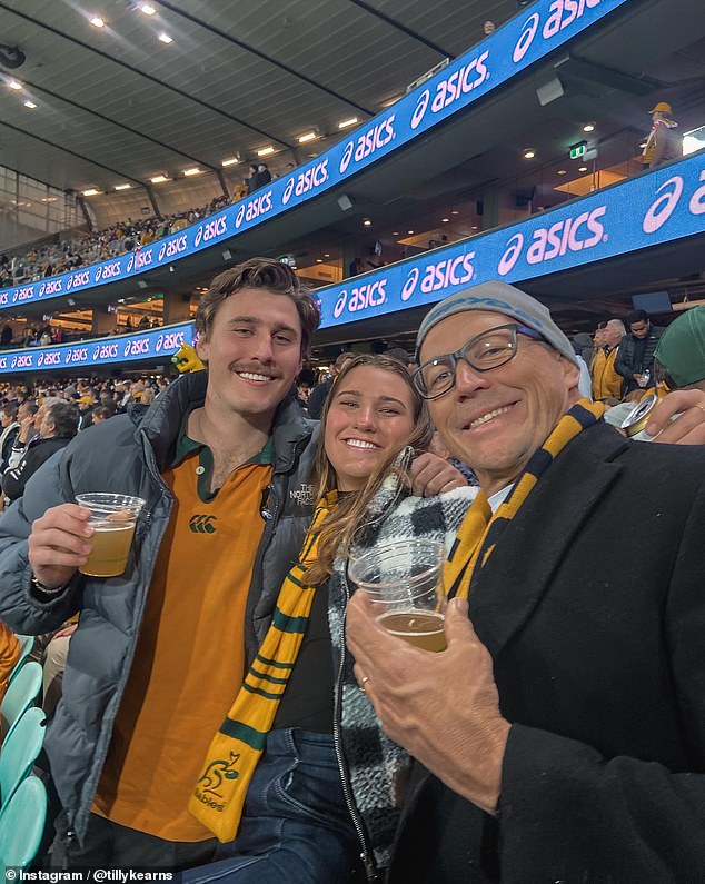 Matilda, centre, spends time with her famous father Phil, right, at a Wallabies match.