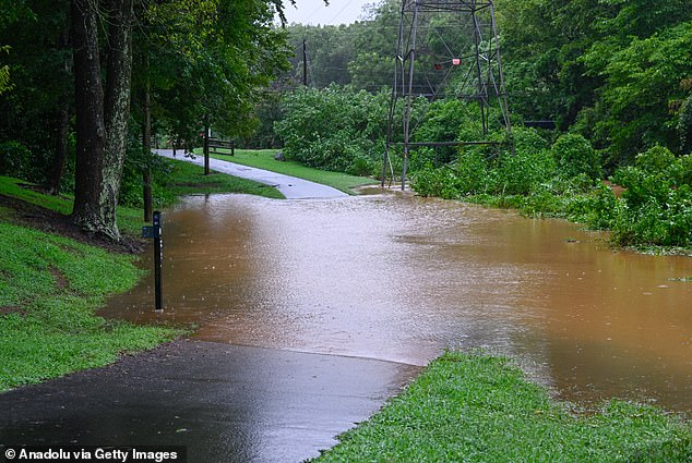 Mid-Atlantic states and parts of New York and New England will see significant rainfall that could cause dangerous flooding over the weekend (pictured: Charlotte, North Carolina, on Thursday)