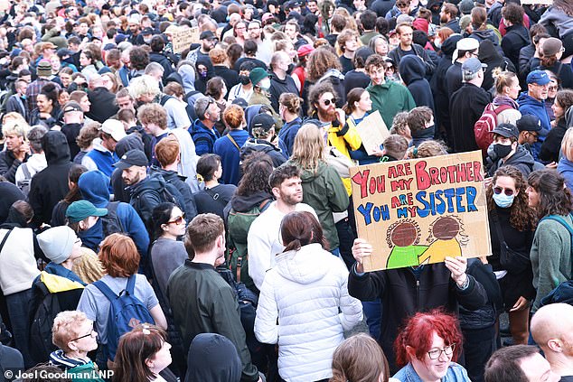 A large gathering of anti-racist protesters outside St Anne's Centre in Toxteth, Liverpool