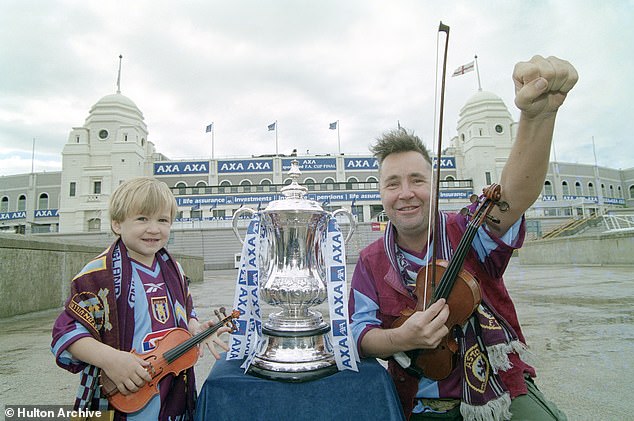 Aston Villa fan Nigel Kennedy and his son Sark in 2000. Sark, now 27, was sentenced during the Covid-19 pandemic when Nigel was in lockdown in Poland, so was unable to even see his son in court or in prison.