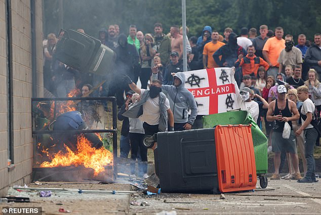 Thugs during a far-right anti-immigration protest in Rotherham on August 4