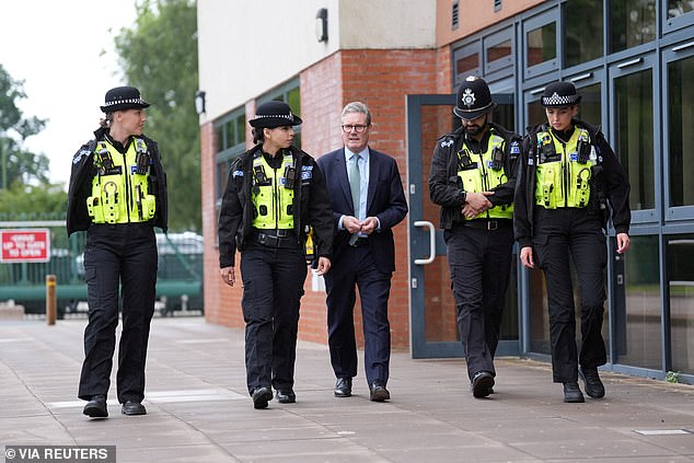 The monarch spoke to police chiefs and Prime Minister Sir Keir Starmer (pictured, visiting Solihull on Thursday).