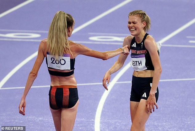 She was consoled by teammate Eilish McColgan (left), who finished 15th.