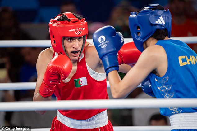 Imane Khelif of Algeria hits Liu Yang of the People's Republic of China during the final