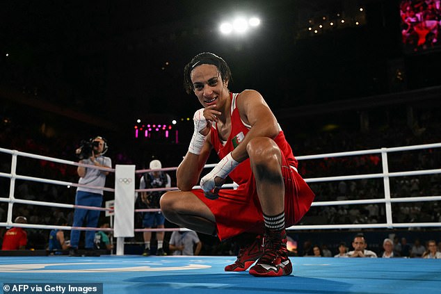 Algerian Imane Khelif reacts after beating China's Yang Liu