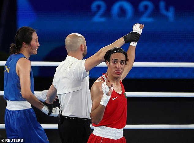 Imane Khelif of Algeria celebrates her victory against Liu Yang of China