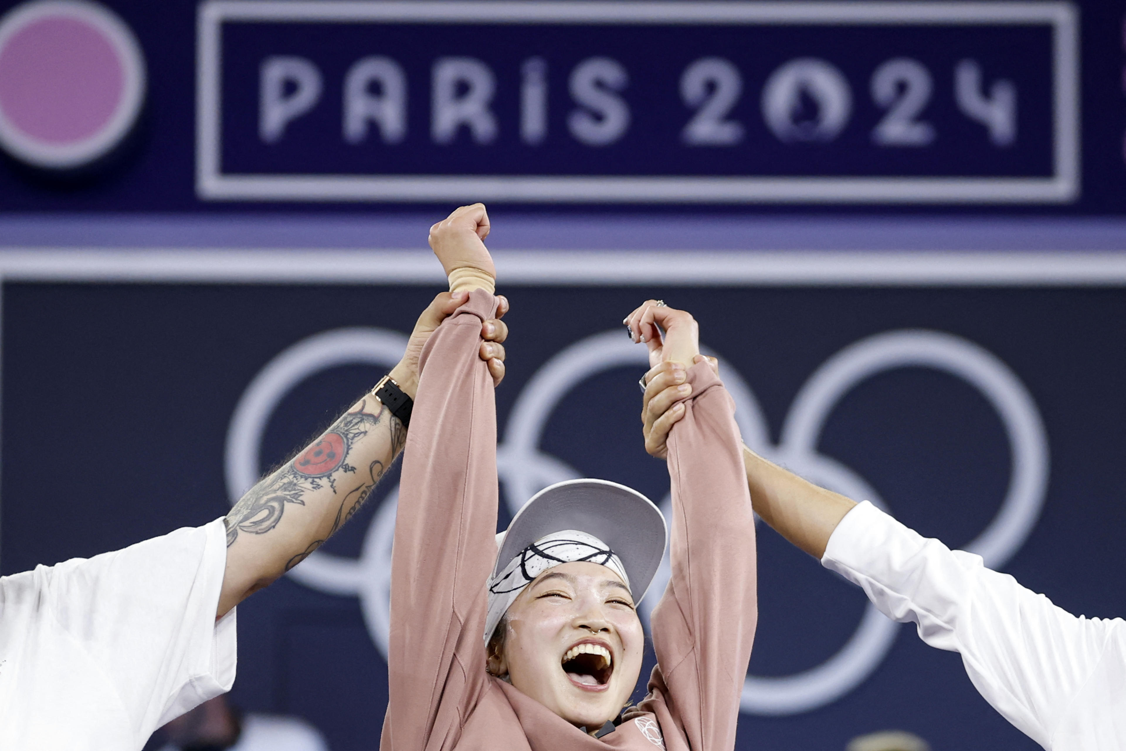 Japan's Ami Yuasa, known as Ami, celebrates winning the gold medal at the end of the Paris 2024 Olympic Games women's break dancing gold medal battle at La Concorde in Paris, on August 9, 2024. (Odd Andersen/AFP/Getty Images)