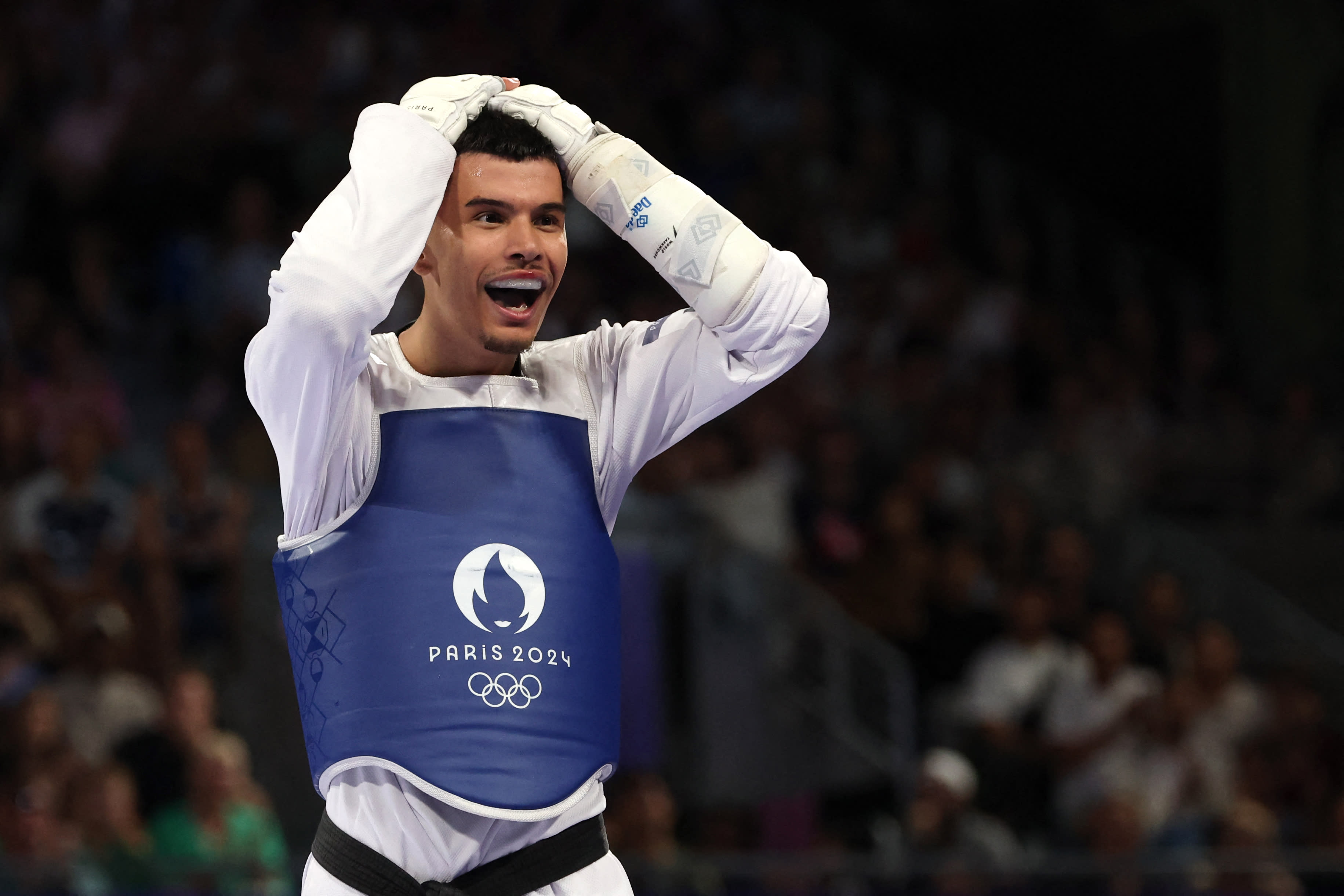 Denmark's Edi Hrnic celebrates after beating South Korea's Seo Geon-woo in the men's -80kg taekwondo bronze medal match at the Paris 2024 Olympic Games at the Grand Palais in Paris on August 9, 2024. (David Gray/AFP/Getty Images)