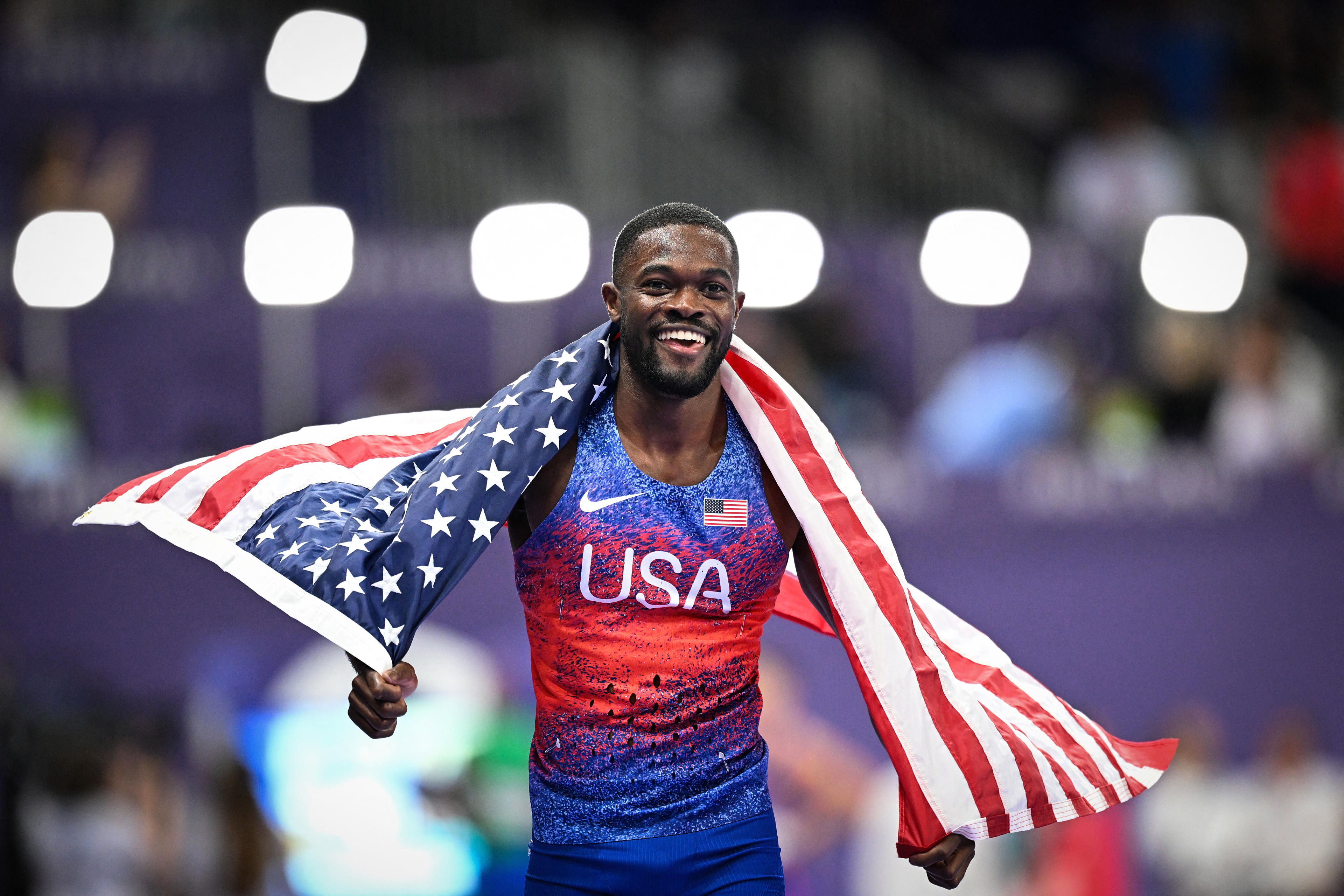 USA's Rai Benjamin celebrates after winning the men's 400m hurdles final of the athletics event at the Paris 2024 Olympic Games at the Stade de France in Saint-Denis, north of Paris, on August 9, 2024. (Kirill Kudryavtsev/AFP/Getty Images)