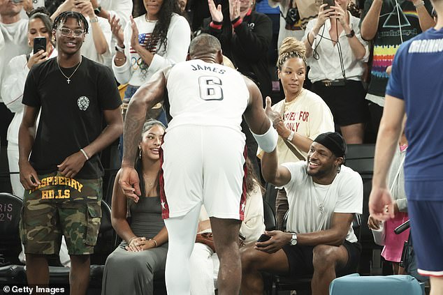 The James clan was all smiles as LeBron celebrated his team's victory with them.