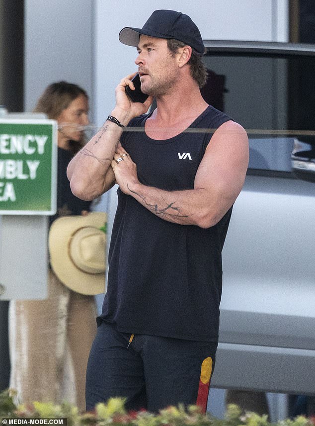 The 40-year-old superstar showed off his arm muscles in a black tank top paired with black pants.