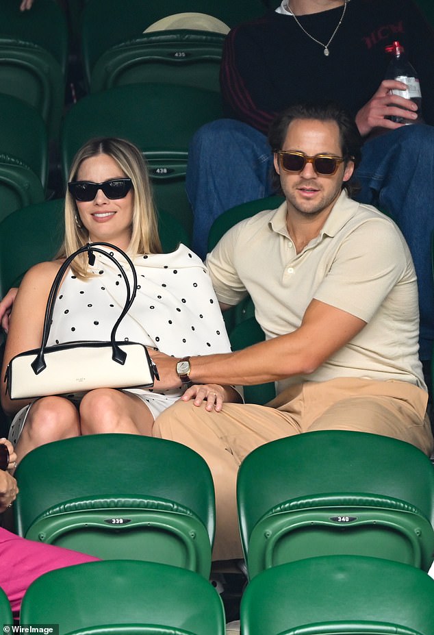 The pair were spotted in the crowd at Wimbledon last month as Tom placed a hand on Margot's baby bump.