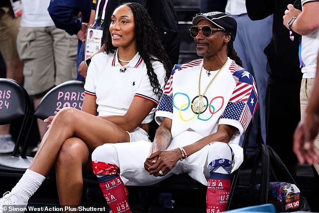 The 52-year-old rapper was joined by WNBA star A'ja Wilson as they sat courtside to watch the United States take on Brazil in the thrilling match at the Bercy Arena in Paris.