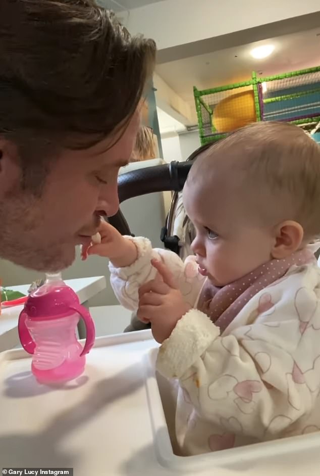 He lovingly fed Bonnie in her high chair.