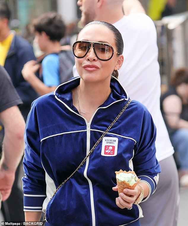 She completed the outfit with stylish aviator sunglasses.