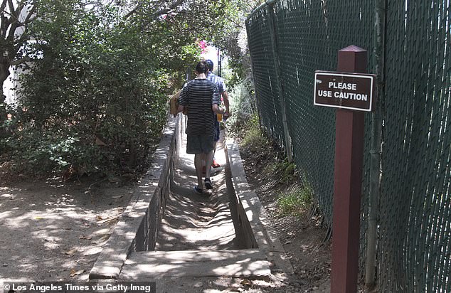 Beach users at the Lechuza Beach public access point from Broad Beach Rd. in Malibu on June 29, 2014