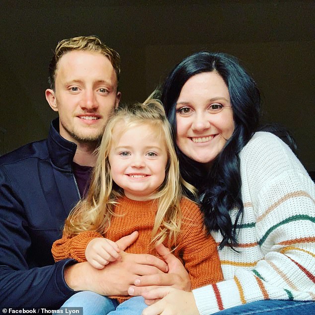 Thomas and Mackenzie, pictured with their youngest daughter, were celebrating their first wedding anniversary with their extended family.