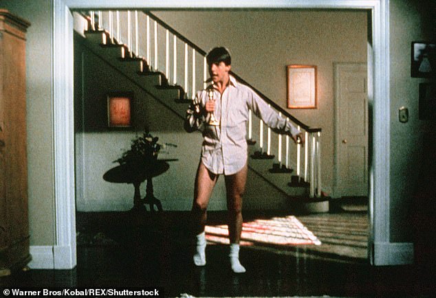 The film Risky Business (1983) starring Tom Cruise (pictured) has seen its rating reduced from 18 to 15 because of its references to 