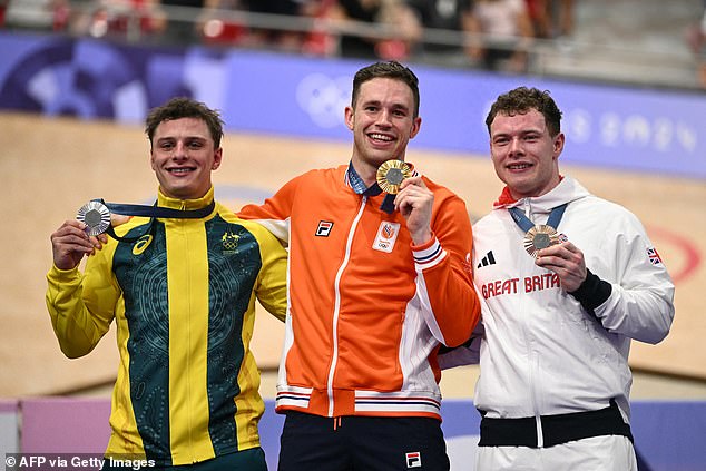 Carlin, right, was booed by Dutch fans as he received his bronze medal on Friday.