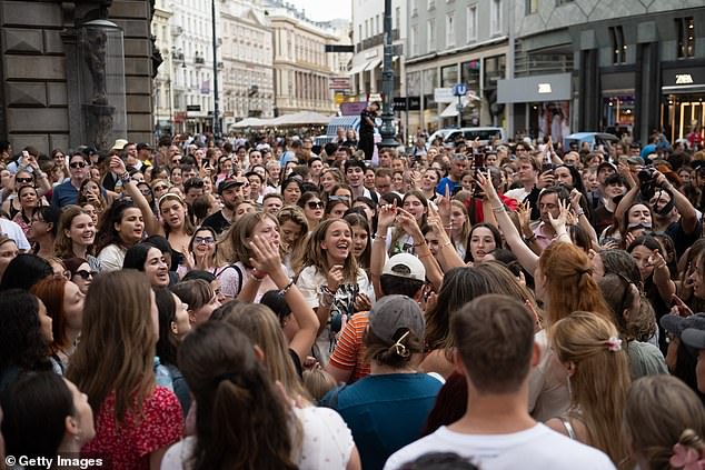 Although disappointed not to be able to attend the shows, fans took to the streets to sing along to Swift's songs and exchange friendship bracelets (Photo from Thursday in Vienna)